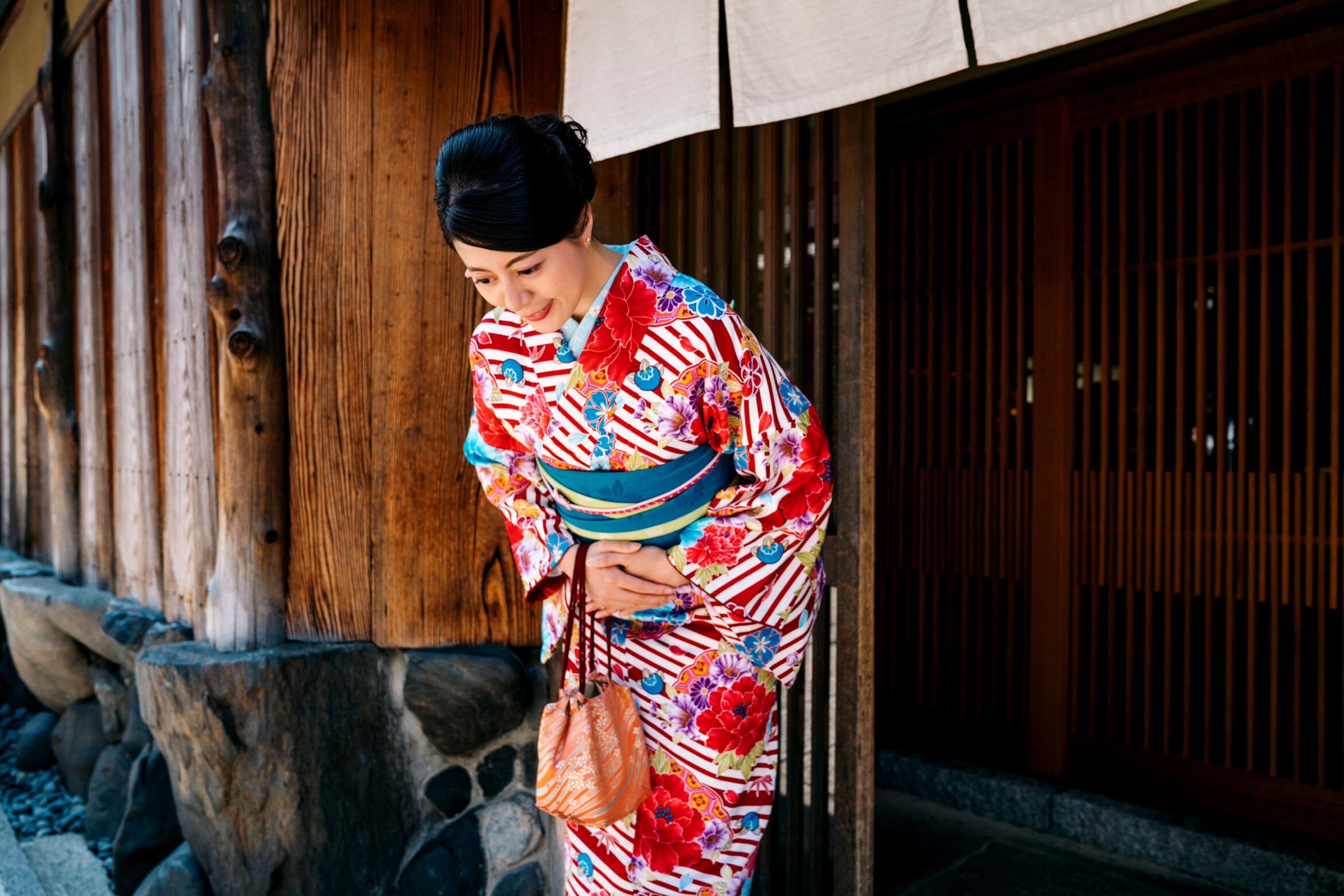 Japanese lady bowing with beautiful kimono
